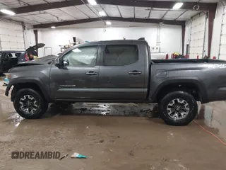 2021 Toyota Tacoma SR z VIN 5TFCZ5AN1MX268854, wystawiony jako IAAI lot #41608266 z przebiegiem 45 823 mil mil oraz . Historia ofert i sprzedaży dostępna na DreamBid. Obrazek 15.