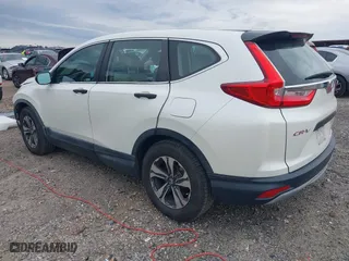 2018 Honda CR-V LX with VIN 2HKRW5H39JH417591, listed as a IAAI auction lot 41762656 with 86,957 mi miles. Bid and sale history available at carsss.com. Image 3.