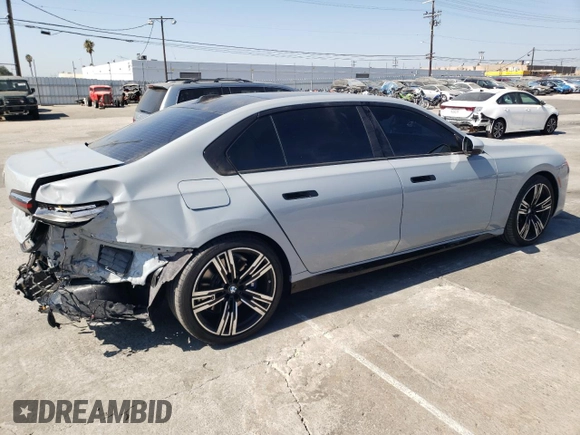 2023 BMW 7 Series 740i with VIN WBA23EH09PCM67327, listed as a Copart auction lot 73387174 with 18,228 mi miles and Salvage Title. Bid and sale history available at carsss.com. Image 3.