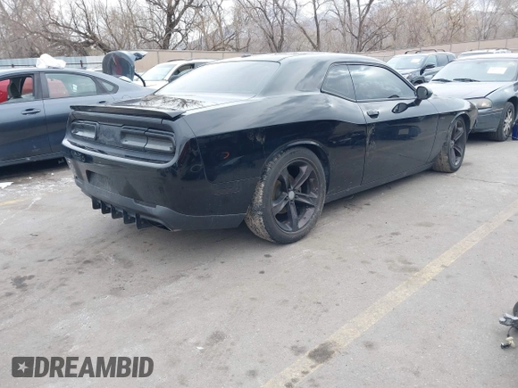 2015 Dodge Challenger R/T with VIN 2C3CDZATXFH712765, listed as a IAAI auction lot 41817210 with 99,535 mi miles and . Bid and sale history available at DreamBid. Image 4.