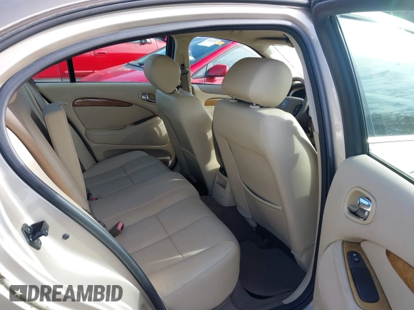 2005 Jaguar S-Type with VIN SAJWA01T45FN28372, listed as a IAAI auction lot 41461878 with Not Provided miles and . Bid and sale history available at DreamBid. Image 7.