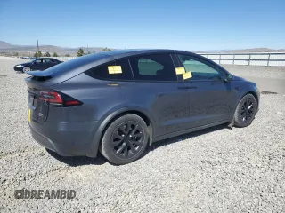 2023 Tesla Model X with VIN 7SAXCAE52PF380229, listed as a Copart auction lot 53535065 with 42,456 mi miles and Salvage Title. Bid and sale history available at DreamBid. Image 3.