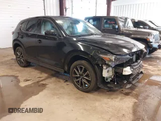 2017 Mazda CX-5 Grand Touring with VIN JM3KFBDLXH0206999, listed as a IAAI auction lot 41649611 with 73,382 mi miles. Bid and sale history available at carsss.com. Image 1.