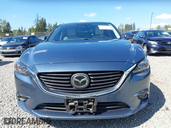 2016 Mazda Mazda6 i Grand Touring with VIN JM1GJ1W51G1436977, listed as a IAAI auction lot 42097363 with 128,941 mi miles. Bid and sale history available at carsss.com. Image 12.