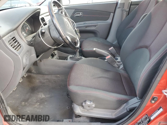 2009 Kia Rio LX with VIN KNADE243X96587429, listed as a Copart auction lot 46500825 with 116,557 mi miles and Salvage Title. Bid and sale history available at carsss.com. Image 7.