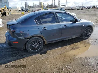 2008 Mazda 3 i Touring Value with VIN JM1BK32F881109043, listed as a Copart auction lot 50959255 with 216,608 mi miles and Salvage Title. Bid and sale history available at DreamBid. Image 3.