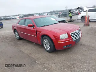 2009 Chrysler 300 Touring with VIN 2C3LA53V09H565585, listed as a IAAI auction lot 41548291 with 202,350 mi miles. Bid and sale history available at carsss.com. Image 1.