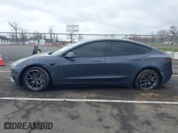 2022 Tesla Model 3 Long Range with VIN 5YJ3E1EB9NF206943, listed as a IAAI auction lot 41911040 with 69,920 mi miles and . Bid and sale history available at DreamBid. Image 14.