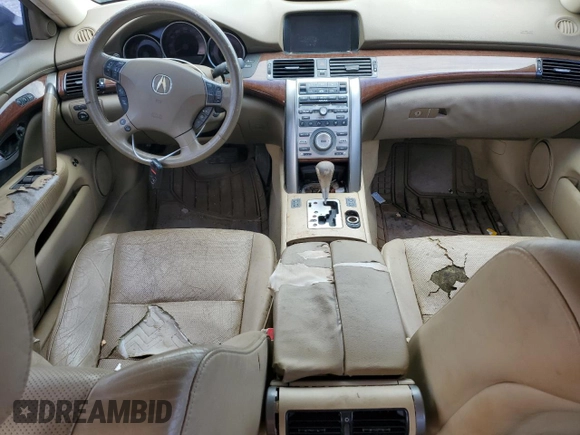 2006 Acura RL z VIN JH4KB16586C010597, wystawiony jako Copart lot #53846535 z przebiegiem 212 219 mil mil oraz Szkoda całkowita • Salvage title. Historia ofert i sprzedaży dostępna na DreamBid. Obrazek 8.