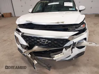 2019 Hyundai Santa Fe Limited with VIN 5NMS5CAD2KH021934, listed as a IAAI auction lot 40726332 with 52,994 mi miles. Bid and sale history available at carsss.com. Image 6.