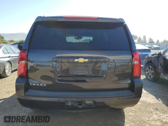 2015 Chevrolet Tahoe LT z VIN 1GNSKBKC6FR612639, wystawiony jako Copart lot #55512645 z przebiegiem 211 510 mil mil oraz Czysty tytuł • Clean title. Historia ofert i sprzedaży dostępna na DreamBid. Obrazek 6.