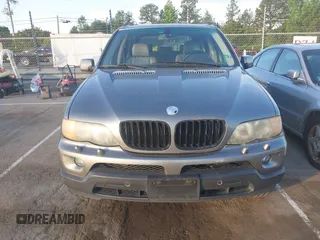 2004 BMW X5 4.4i with VIN 5UXFB53514LV09431, listed as a IAAI auction lot 42142099 with 181,951 mi miles. Bid and sale history available at carsss.com. Image 6.