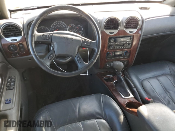 2002 GMC Envoy SLE with VIN 1GKDS13S022512481, listed as a Copart auction lot 74701454 with 0 mi miles and Salvage Title. Bid and sale history available at carsss.com. Image 8.