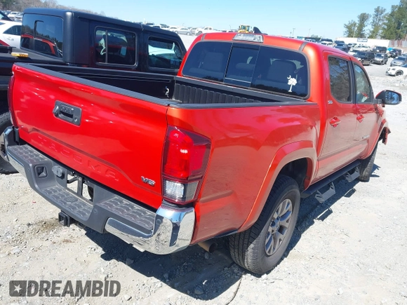 2018 Toyota Tacoma SR5 with VIN 5TFAZ5CN5JX066115, listed as a IAAI auction lot 41816133 with 70,283 mi miles and . Bid and sale history available at DreamBid. Image 4.