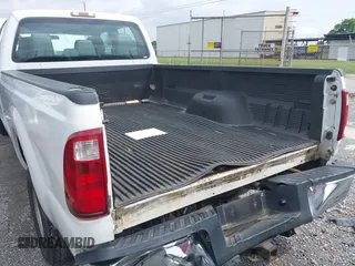 2015 Ford F-250 Lariat with VIN 1FT7W2B6XFEC33499, listed as a IAAI auction lot 42114064 with 215,314 mi miles and . Bid and sale history available at carsss.com. Image 6.