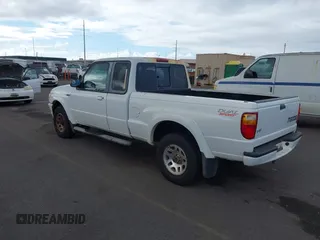2002 Mazda B-Series Truck DS z VIN 4F4YR16U32TM12981, wystawiony jako IAAI lot #42421997 z przebiegiem 130 610 mil mil oraz . Historia ofert i sprzedaży dostępna na DreamBid. Obrazek 3.