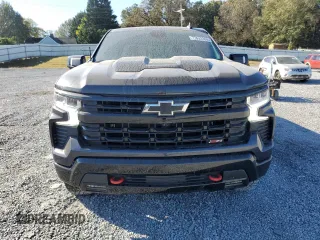 2022 Chevrolet Silverado 1500 LT Trail Boss with VIN 3GCUDFED2NG561825, listed as a Copart auction lot 77632284 with 34,448 mi miles and Salvage Title. Bid and sale history available at DreamBid. Image 5.
