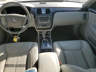 2010 Cadillac DTS w/1SC with VIN 1G6KD5EYXAU126775, listed as a Copart auction lot 77207094 with 100,288 mi miles and Salvage Title. Bid and sale history available at carsss.com. Image 8.