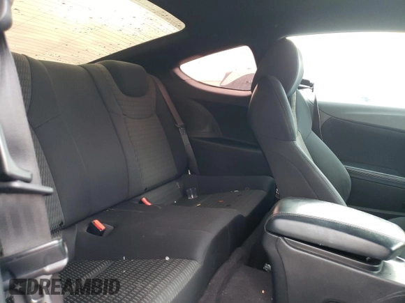 2014 Hyundai Genesis Coupe 2.0T z VIN KMHHT6KD1EU114887, wystawiony jako Copart lot #52775804 z przebiegiem 76 891 mil mil oraz Szkoda całkowita • Salvage title. Historia ofert i sprzedaży dostępna na DreamBid. Obrazek 11.
