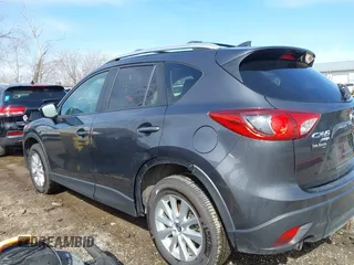 2016 Mazda CX-5 Touring with VIN JM3KE4CY9G0915305, listed as a IAAI auction lot 41840519 with 188,702 mi miles and . Bid and sale history available at carsss.com. Image 6.