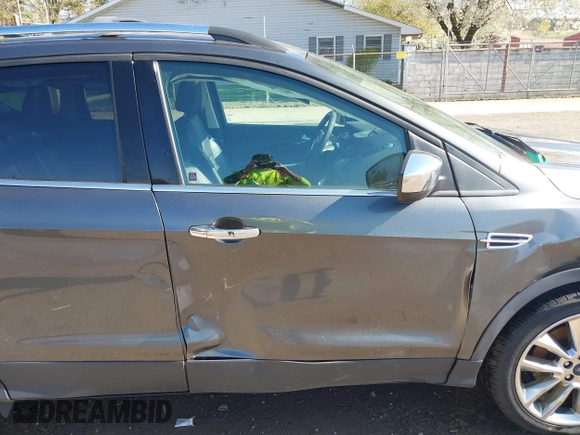 2015 Ford Escape SE with VIN 1FMCU9G97FUA89251, listed as a IAAI auction lot 41919240 with 148,472 mi miles and . Bid and sale history available at DreamBid. Image 18.