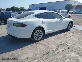 2016 Tesla Model S 70 kWh Battery with VIN 5YJSA1E16GF129997, listed as a IAAI auction lot 42108270 with 1 mi miles. Bid and sale history available at carsss.com. Image 4.