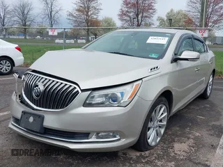 2014 Buick LaCrosse Leather with VIN 1G4GB5G39EF291832, listed as a IAAI auction lot 42023142 with 80,848 mi miles and . Bid and sale history available at DreamBid. Image 2.