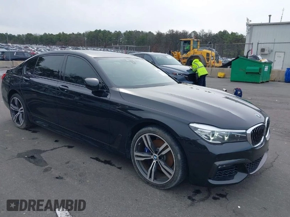 2019 BMW 7 Series 740i with VIN WBA7E2C57KB217973, listed as a IAAI auction lot 39064321 with 54,818 mi miles and . Bid and sale history available at DreamBid. Image 1.