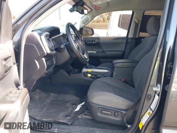 2022 Toyota Tacoma SR5 z VIN 3TMBZ5DN5NM036322, wystawiony jako IAAI lot #42437939 z przebiegiem 77 805 mil mil oraz . Historia ofert i sprzedaży dostępna na DreamBid. Obrazek 5.