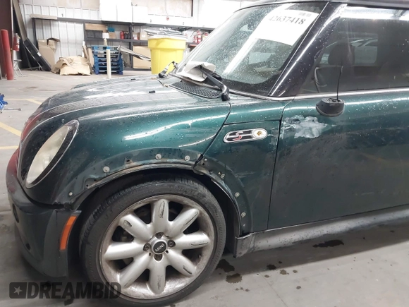 2006 MINI Hardtop S z VIN WMWRE33536TJ40341, wystawiony jako IAAI lot #42637418 z przebiegiem 93 338 mil mil oraz . Historia ofert i sprzedaży dostępna na DreamBid. Obrazek 6.