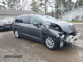 2021 Chrysler Pacifica Touring L with VIN 2C4RC1BG7MR584956, listed as a IAAI auction lot 42016887 with 51,415 mi miles and . Bid and sale history available at DreamBid. Image 1.