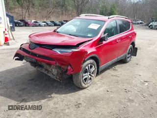 2016 Toyota RAV4 LE with VIN 2T3BFREV7GW517043, listed as a IAAI auction lot 41828999 with 103,587 mi miles. Bid and sale history available at carsss.com. Image 2.