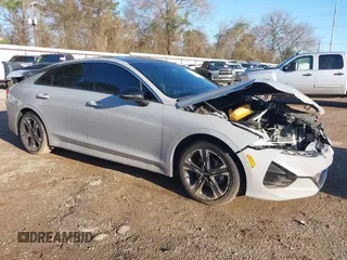 2023 Kia K5 GT-Line z VIN 5XXG64J22PG224836, wystawiony jako IAAI lot #41743997 z przebiegiem 26 633 mil mil oraz . Historia ofert i sprzedaży dostępna na DreamBid. Obrazek 1.