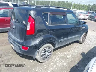 2013 Kia Soul with VIN KNDJT2A5XD7770253, listed as a IAAI auction lot 42012460 with 254,506 mi miles. Bid and sale history available at carsss.com. Image 4.