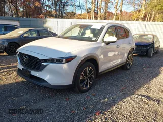 2023 Mazda CX-5 2.5 S Premium Plus Package with VIN JM3KFBEM2P0244281, listed as a IAAI auction lot 40820295 with 10,886 mi miles. Bid and sale history available at carsss.com. Image 17.