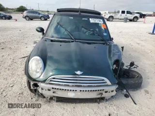 2007 MINI Convertible with VIN WMWRF33567TF66784, listed as a Copart auction lot 71571744 with 115,008 mi miles and Salvage Title. Bid and sale history available at DreamBid. Image 5.