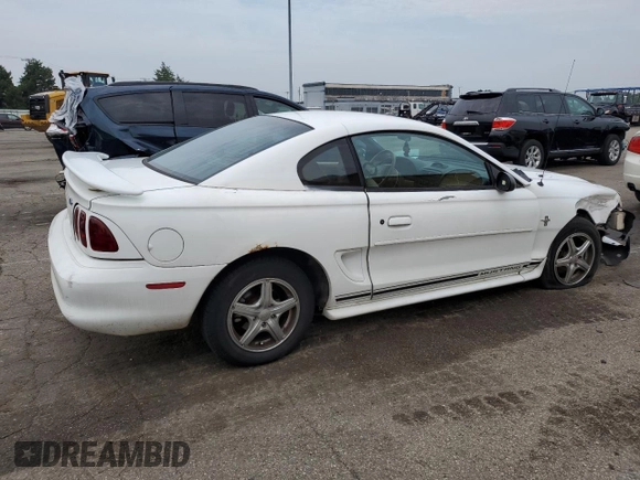 1997 Ford Mustang with VIN 1FALP4046VF180467, listed as a Copart auction lot 60754265 with 154,676 mi miles and Salvage title. Bid and sale history available at DreamBid. Image 3.