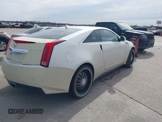 2011 Cadillac CTS Performance with VIN 1G6DJ1ED3B0142767, listed as a IAAI auction lot 41676404 with 238,027 mi miles and . Bid and sale history available at DreamBid. Image 4.