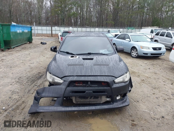 2010 Mitsubishi Lancer Evolution GSR with VIN JA32W8FV1AU012725, listed as a IAAI auction lot 41542629 with 124,347 mi miles and . Bid and sale history available at DreamBid. Image 12.