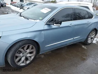 2014 Chevrolet Impala LTZ with VIN 1G1145SL0EU132598, listed as a IAAI auction lot 41264394 with 84,783 mi miles. Bid and sale history available at carsss.com. Image 6.