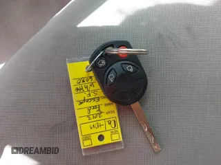 2013 Ford Escape SE with VIN 1FMCU0G90DUB37052, listed as a IAAI auction lot 42132973 with 169,975 mi miles and . Bid and sale history available at DreamBid. Image 11.