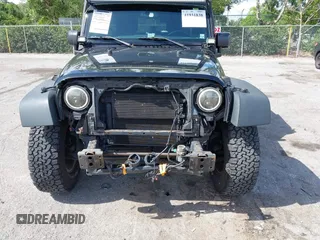 2016 Jeep Wrangler Unlimited Sport with VIN 1C4HJWDG3GL234653, listed as a IAAI auction lot 41931838 with 85,375 mi miles and . Bid and sale history available at DreamBid. Image 6.