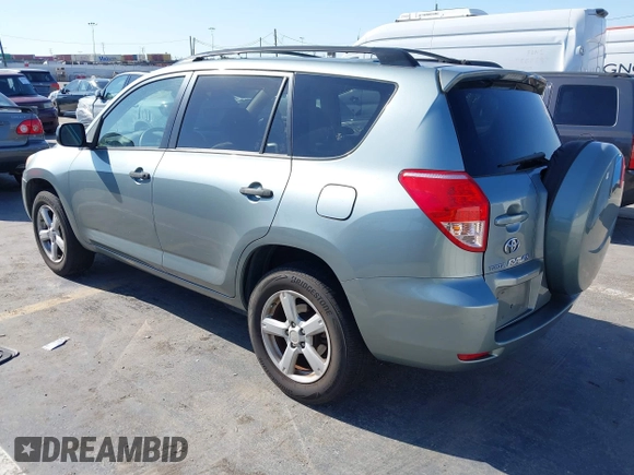 2006 Toyota RAV4 with VIN JTMZD33V465012121, listed as a IAAI auction lot 42013354 with 214,726 mi miles. Bid and sale history available at carsss.com. Image 3.