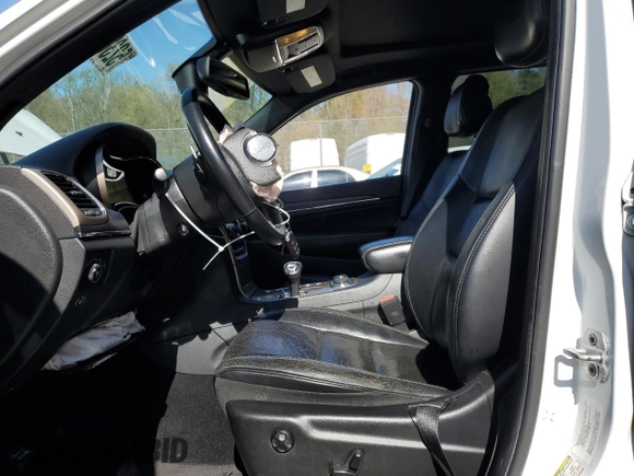 2014 Jeep Grand Cherokee Limited with VIN 1C4RJFBG3EC152782, listed as a Copart auction lot 52367875 with 236,427 mi miles and Salvage Title. Bid and sale history available at DreamBid. Image 7.