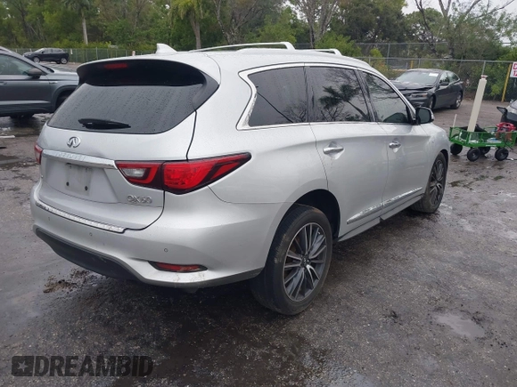 2019 Infiniti QX60 Pure z VIN 5N1DL0MM9KC534133, wystawiony jako IAAI lot #41407744 z przebiegiem 215 402 mil mil oraz . Historia ofert i sprzedaży dostępna na DreamBid. Obrazek 4.