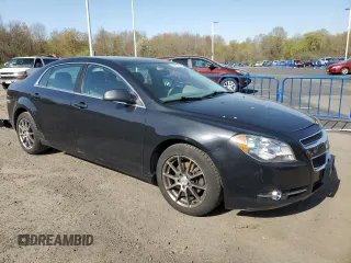 2011 Chevrolet Malibu 1LS with VIN 1G1ZB5E19BF247591, listed as a Copart auction lot 54989215 with 214,244 mi miles and Clean Title. Bid and sale history available at DreamBid. Image 4.