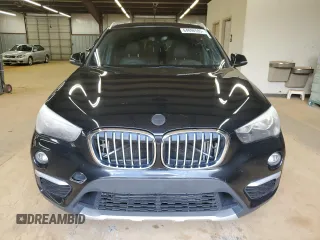 2018 BMW X1 xDrive28i with VIN WBXHT3C32J5F89449, listed as a Copart auction lot 64896595 with 108,804 mi miles and Clean title. Bid and sale history available at DreamBid. Image 5.