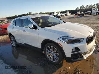 2018 BMW X2 sDrive28i with VIN WBXYJ3C3XJEJ81736, listed as a Copart auction lot 87390404 with 165,522 mi miles and Salvage Title. Bid and sale history available at carsss.com. Image 4.