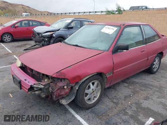 1994 Ford Escort z VIN 1FARP11J8RW128776, wystawiony jako IAAI lot #41502714 z przebiegiem 61 582 mil mil oraz . Historia ofert i sprzedaży dostępna na DreamBid. Obrazek 2.