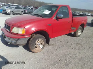 1997 Ford F-150 XL with VIN 1FTDF08W3VKB53525, listed as a IAAI auction lot 41787276 with 165,938 mi miles. Bid and sale history available at carsss.com. Image 2.